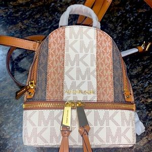 Perfect condition Michael Kors mini rhea colorblock convertible backpack.